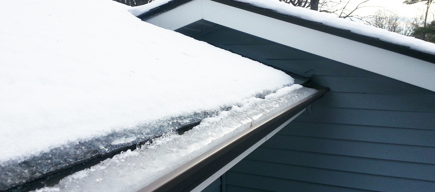 roof and gutters full of snow